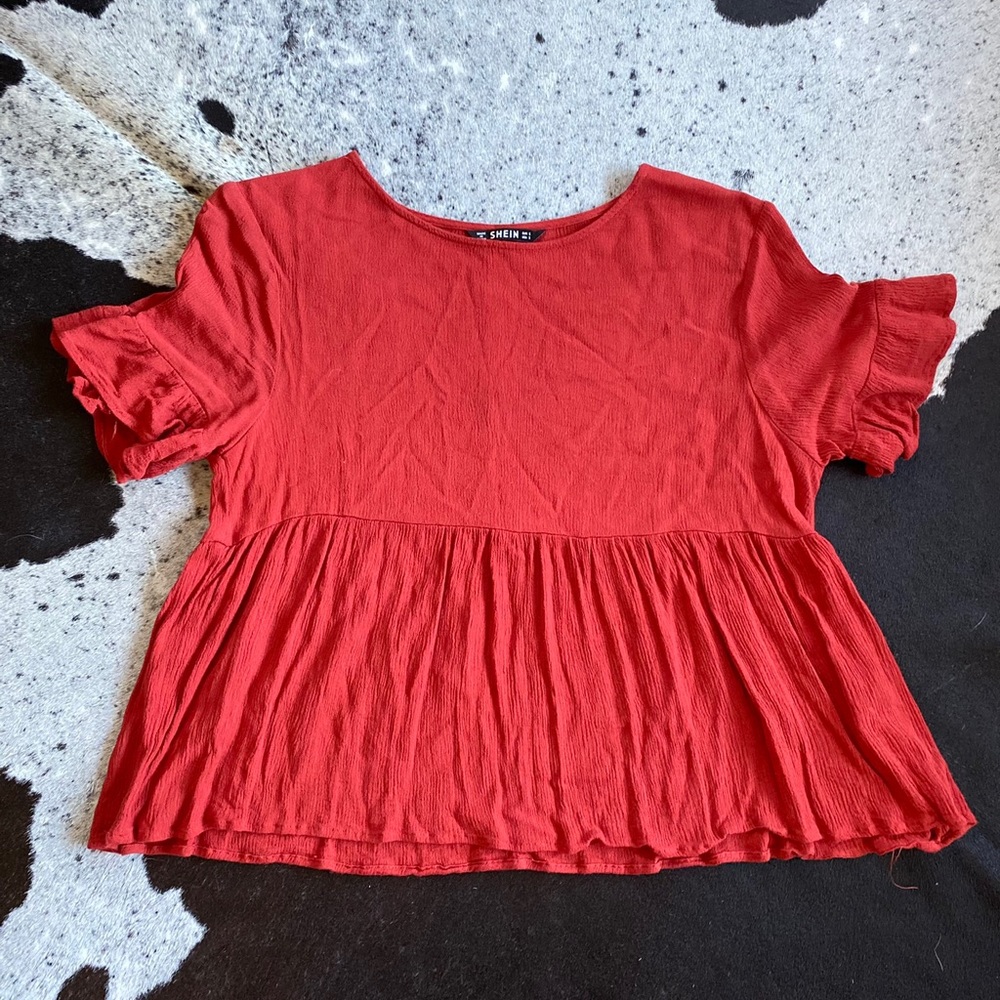 Rust peplum blouse